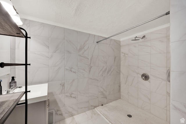 3567 S 3400 W, West Valley City, UT 84119 - full bathroom featuring vanity, tiled shower, and a textured ceiling