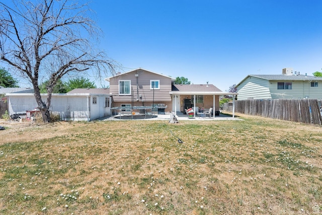 3567 S 3400 W, West Valley City, UT 84119 - rear view of property featuring a patio area