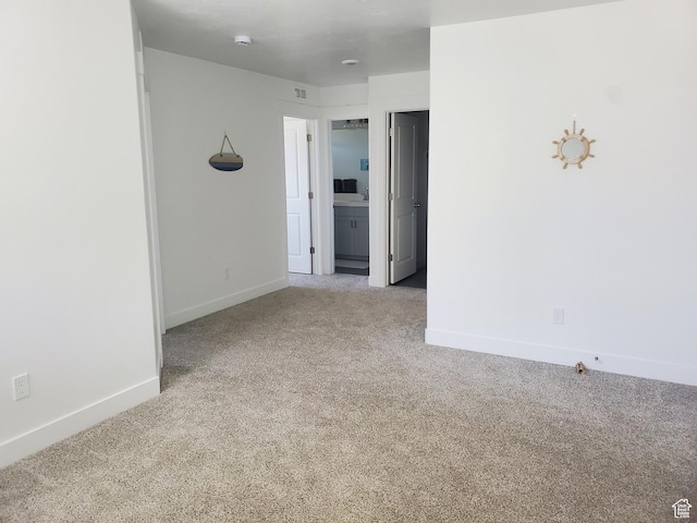 1082 E Springwater Way Unit 812, Eagle Mountain, UT 84005 - spare room featuring carpet floors and a smoke detector