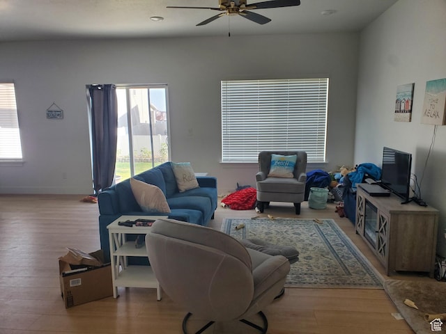 1082 E Springwater Way Unit 812, Eagle Mountain, UT 84005 - living area featuring a ceiling fan and wood finished floors