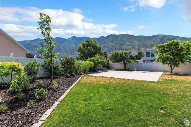 11571 S Lexington Hills Cir E, Sandy, UT 84092 - fenced backyard with a mountain view and a patio area