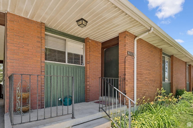 6112 S Vineway Cir E, Salt Lake City, UT 84121 - entrance to property with brick siding and covered porch