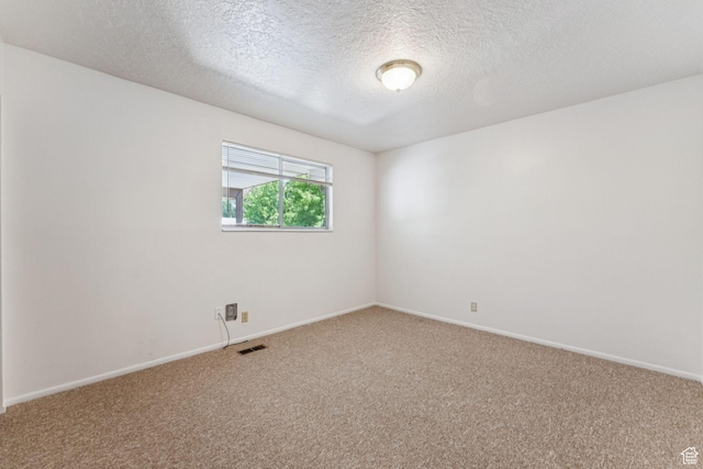 6113 S Vineway Cir, Salt Lake City, UT 84121 - spare room with carpet floors and a textured ceiling
