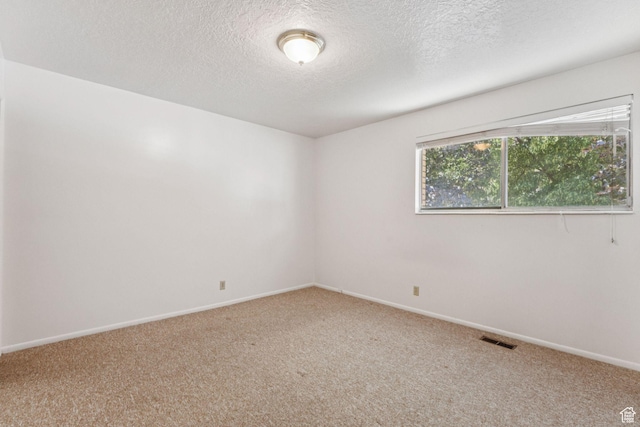 6113 S Vineway Cir, Salt Lake City, UT 84121 - carpeted empty room featuring a textured ceiling and baseboards