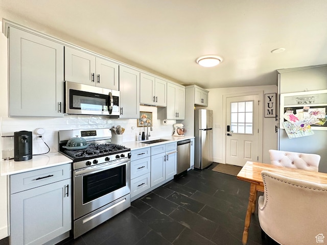 641 E 925 N, Ogden, UT 84404 - kitchen featuring appliances with stainless steel finishes, light countertops, and backsplash