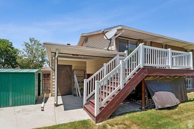 6133 S Vineway Cir, Salt Lake City, UT 84121 - rear view of property with a patio area and a storage shed