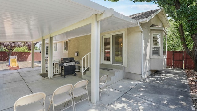 6320 S Hathaway St, Taylorsville, UT 84123 - view of patio / terrace with a grill, a gate, and entry steps