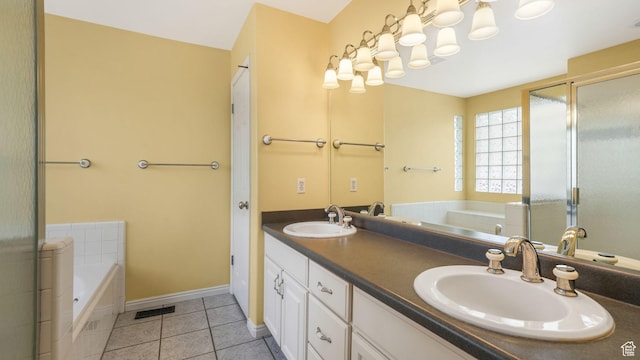 6320 S Hathaway St, Taylorsville, UT 84123 - bathroom featuring double vanity, a garden tub, tile patterned floors, and a shower stall