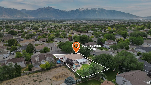 6320 S Hathaway St, Taylorsville, UT 84123 - aerial view of residential area with mountains and property parcel outlined
