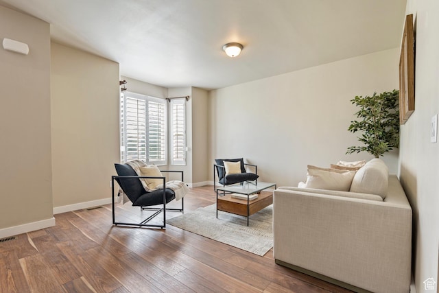 10572 S Kestrel Rise Rd, South Jordan, UT 84009 - living area with wood finished floors and baseboards