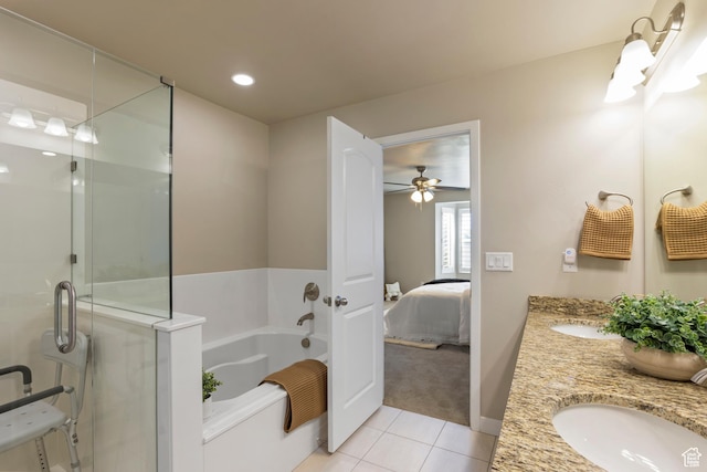 10572 S Kestrel Rise Rd, South Jordan, UT 84009 - bathroom with a garden tub, double vanity, tile patterned flooring, connected bathroom, and ceiling fan