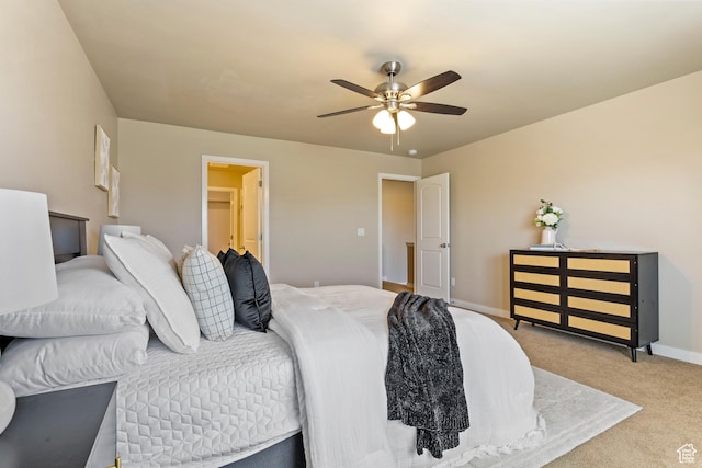 10572 S Kestrel Rise Rd, South Jordan, UT 84009 - bedroom with light colored carpet and a ceiling fan