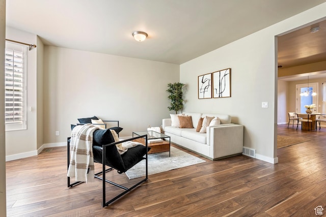 10572 S Kestrel Rise Rd, South Jordan, UT 84009 - living area featuring hardwood / wood-style floors and baseboards