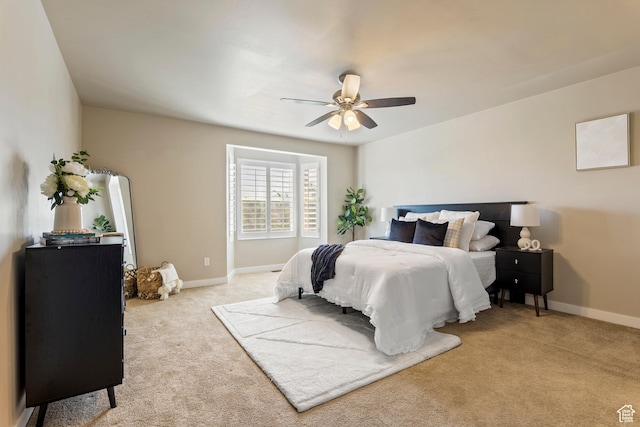 10572 S Kestrel Rise Rd, South Jordan, UT 84009 - bedroom with light colored carpet and ceiling fan
