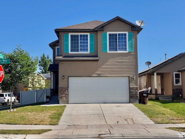 2061 Revere Way, Eagle Mountain, UT 84005 - view of front of home with an attached garage and driveway