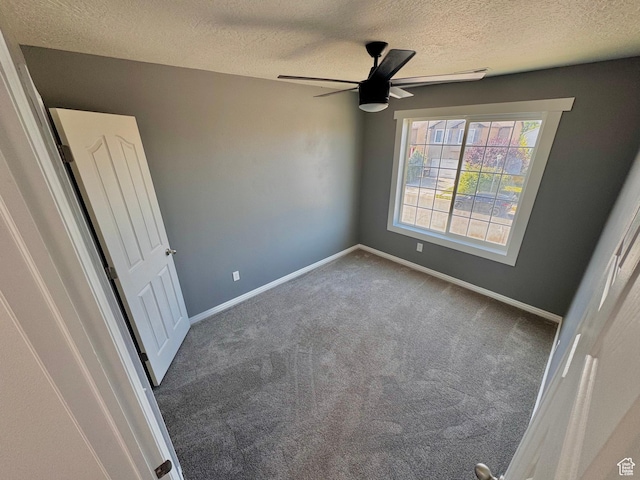 2061 Revere Way, Eagle Mountain, UT 84005 - unfurnished bedroom featuring a textured ceiling, carpet flooring, and a ceiling fan