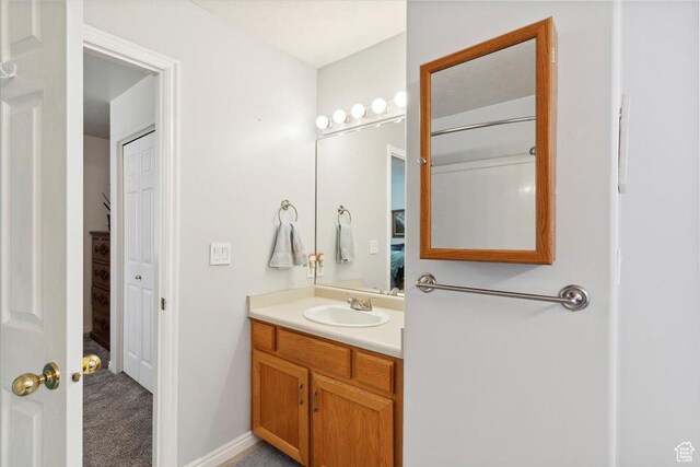 801 W Harrisville Rd N Unit 14, Ogden, UT 84404 - bathroom featuring vanity and ensuite bath