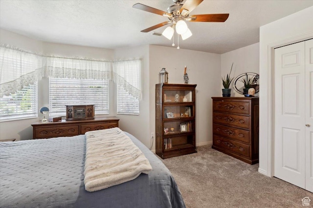 801 W Harrisville Rd N Unit 14, Ogden, UT 84404 - carpeted bedroom featuring a ceiling fan