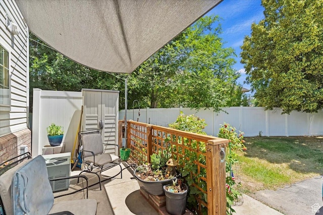 801 W Harrisville Rd N Unit 14, Ogden, UT 84404 - fenced backyard with a patio area