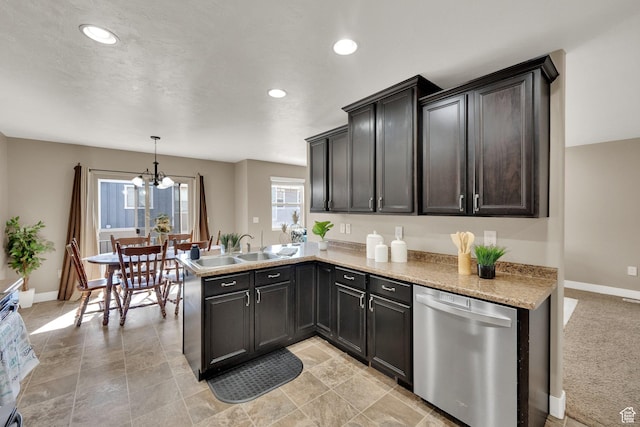 14483 S Ryegate Dr, Herriman, UT 84096 - kitchen featuring stainless steel dishwasher, a chandelier, recessed lighting, a peninsula, and decorative light fixtures