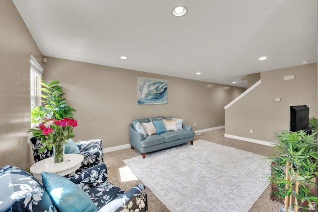 14483 S Ryegate Dr, Herriman, UT 84096 - carpeted living room featuring stairs and recessed lighting