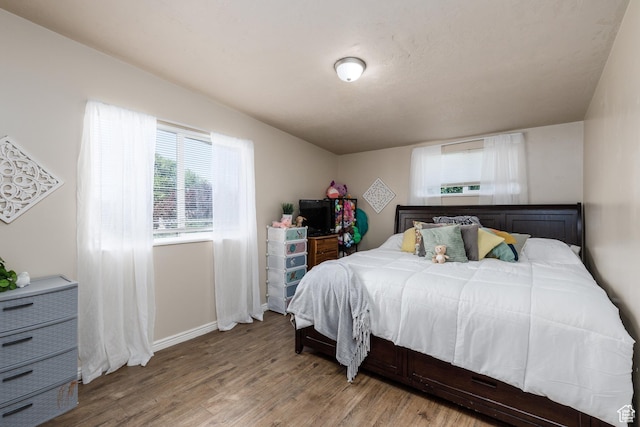 720 E 850 N, Ogden, UT 84404 - bedroom featuring wood finished floors and baseboards