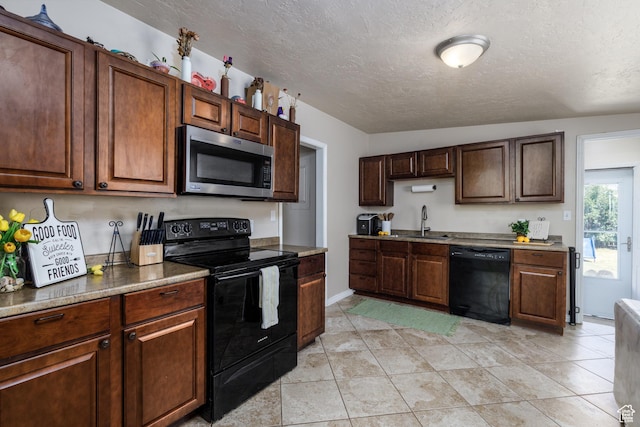 720 E 850 N, Ogden, UT 84404 - kitchen with black appliances and a textured ceiling