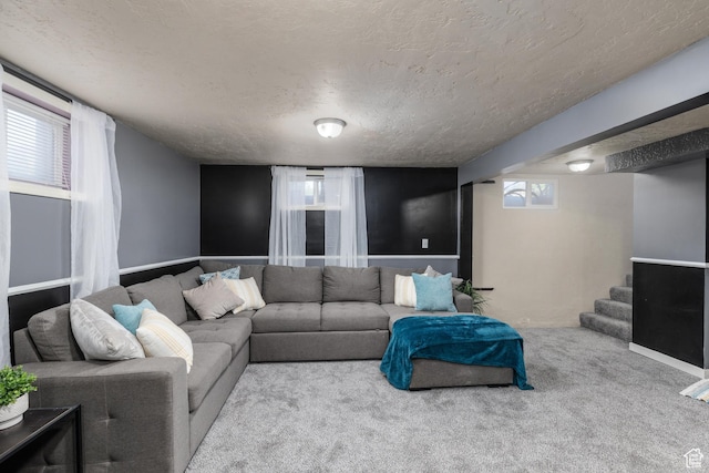 720 E 850 N, Ogden, UT 84404 - carpeted living room featuring a textured ceiling, healthy amount of natural light, and stairway