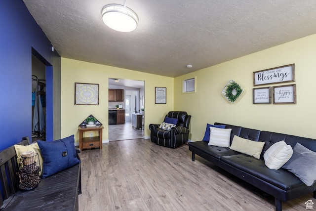 720 E 850 N, Ogden, UT 84404 - living area featuring wood finished floors and a textured ceiling