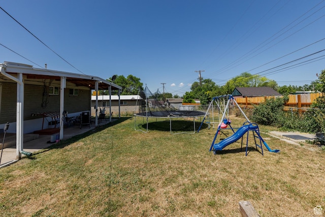 720 E 850 N, Ogden, UT 84404 - view of yard featuring a trampoline, a playground, and a patio