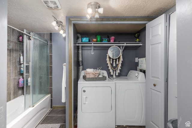 720 E 850 N, Ogden, UT 84404 - washroom with independent washer and dryer, a textured ceiling, and tile patterned floors