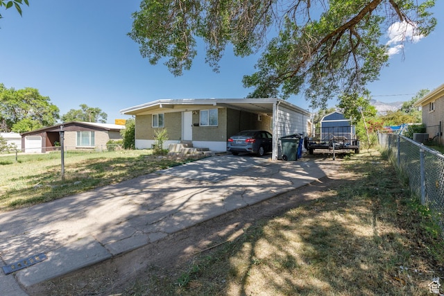 720 E 850 N, Ogden, UT 84404 - view of front of property with driveway and a carport