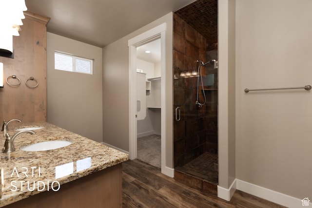 1338 S 1150 W, Payson, UT 84651 - full bathroom featuring wood finished floors, a shower stall, double vanity, and a spacious closet