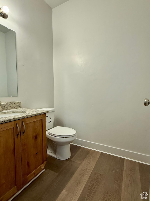 849 N Gleneagles Ct W, Tooele, UT 84074 - half bathroom featuring wood finished floors and vanity