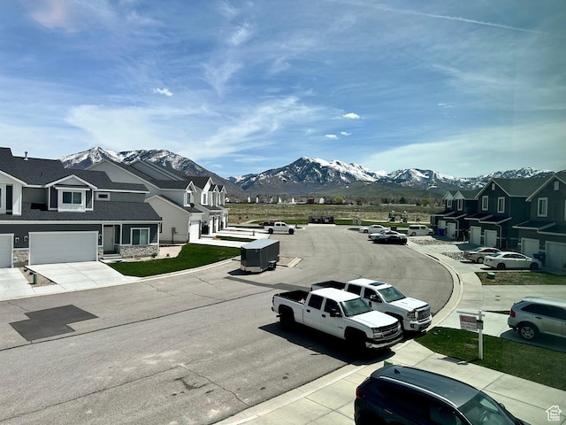 849 N Gleneagles Ct W, Tooele, UT 84074 - view of road featuring a mountain view, curbs, and a residential view