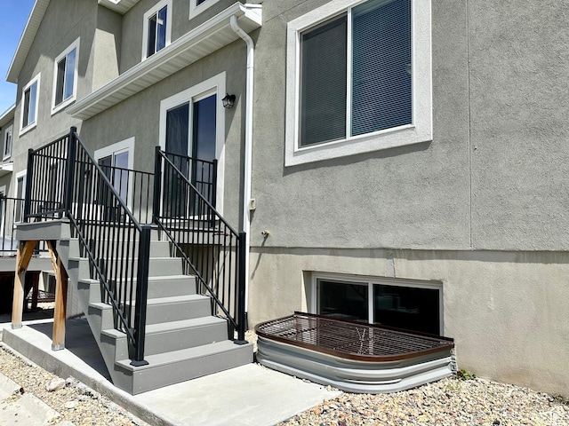 849 N Gleneagles Ct W, Tooele, UT 84074 - doorway to property featuring stucco siding