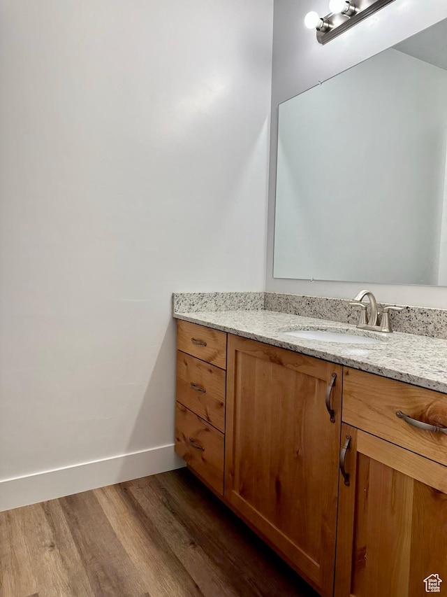 849 N Gleneagles Ct W, Tooele, UT 84074 - bathroom with wood finished floors and vanity