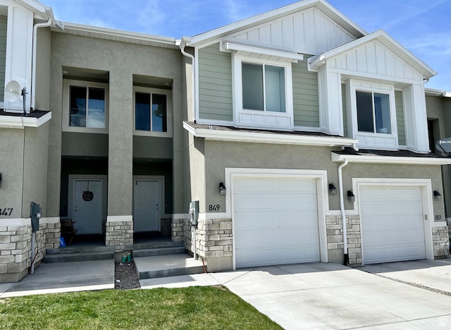 849 N Gleneagles Ct W, Tooele, UT 84074 - multi unit property featuring stone siding, a garage, and stucco siding
