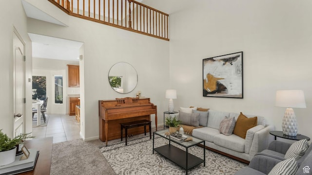1562 S 910 W, Payson, UT 84651 - living room featuring a towering ceiling, light tile patterned flooring, and light colored carpet
