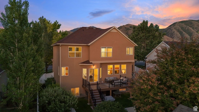 1562 S 910 W, Payson, UT 84651 - rear view of house with stucco siding, stairway, and a deck with mountain view