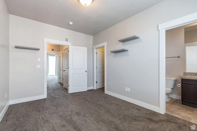 11463 S Lake Run Rd W, South Jordan, UT 84009 - unfurnished bedroom featuring carpet floors, a textured ceiling, and ensuite bathroom