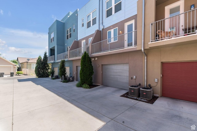 11463 S Lake Run Rd W, South Jordan, UT 84009 - view of property featuring an attached garage and driveway