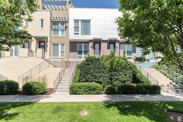 11463 S Lake Run Rd W, South Jordan, UT 84009 - multi unit property featuring stairway, stucco siding, and a front yard