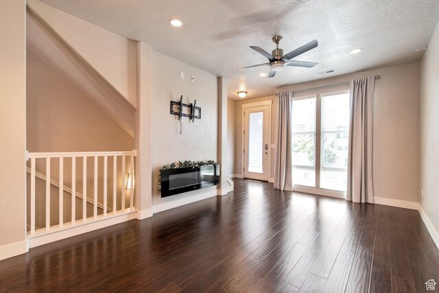 11463 S Lake Run Rd W, South Jordan, UT 84009 - unfurnished living room with a ceiling fan, wood finished floors, a textured ceiling, and recessed lighting
