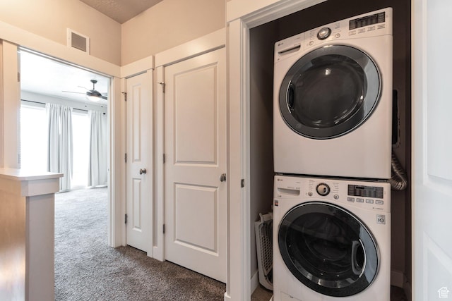 11463 S Lake Run Rd W, South Jordan, UT 84009 - washroom with estacked washer and dryer, carpet flooring, and a ceiling fan