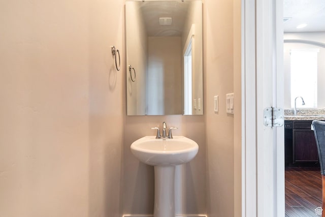 11463 S Lake Run Rd W, South Jordan, UT 84009 - bathroom with a sink and wood finished floors