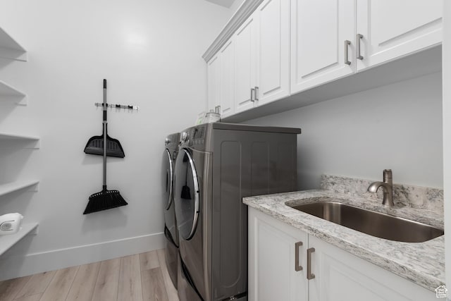 520 Lacey Way N, Salt Lake, UT 84054 - laundry room with cabinet space, separate washer and dryer, and light wood-type flooring