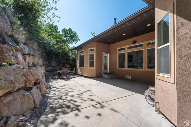 520 Lacey Way N, Salt Lake, UT 84054 - view of patio / terrace featuring outdoor dining space and entry steps