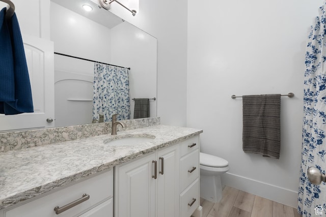 520 Lacey Way N, Salt Lake, UT 84054 - full bath with vanity, wood finished floors, and curtained shower