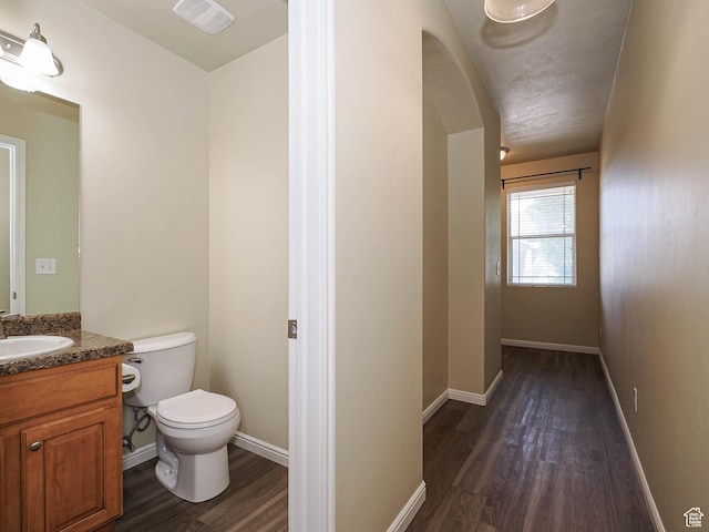 6900 S Village Haven Ln W, Midvale, UT 84047 - bathroom featuring wood finished floors and vanity